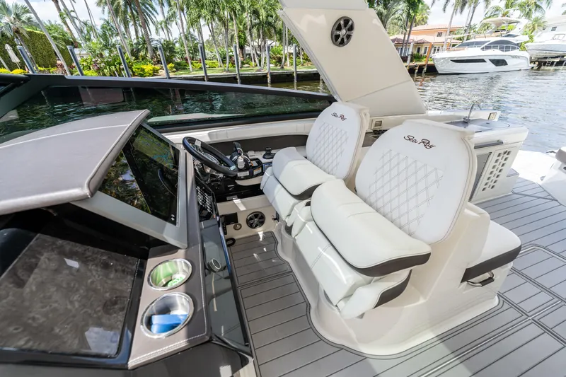  Yacht Photos Pics 2019 Sea Ray SLX 400 Outboard cockpit with luxurious seating and modern controls.
