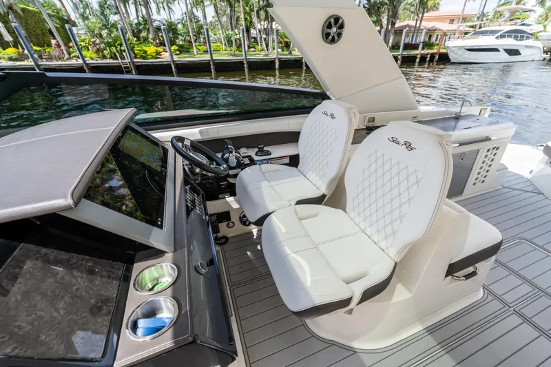  Yacht Photos Pics 2019 Sea Ray SLX 400 Outboard cockpit with luxurious seating and modern controls.