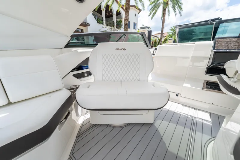  Yacht Photos Pics Luxurious interior of 2019 Sea Ray SLX 400 Outboard with white seating and modern design.