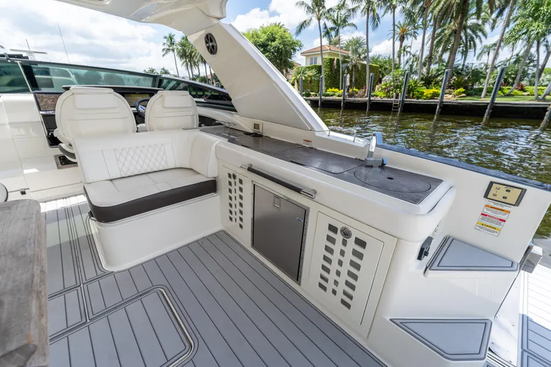  Yacht Photos Pics Luxurious 2019 Sea Ray SLX 400 Outboard boat interior with seating and kitchenette.
