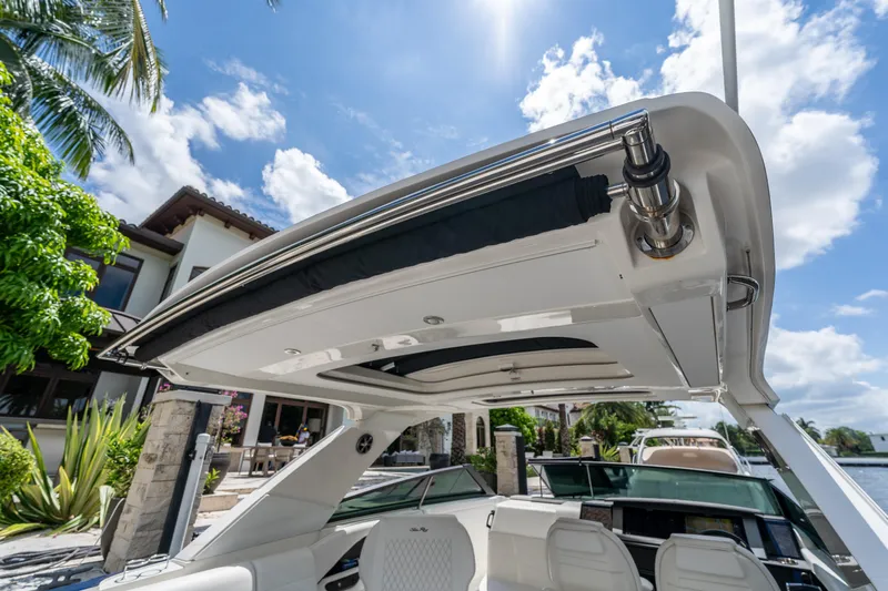  Yacht Photos Pics 2019 Sea Ray SLX 400 Outboard boat with sleek design under a sunny sky.