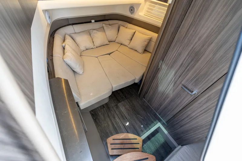  Yacht Photos Pics 2019 Sea Ray SLX 400 Outboard cabin interior with cozy seating and modern design.