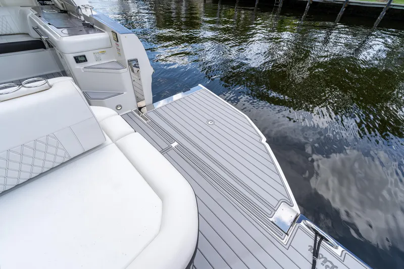  Yacht Photos Pics 2019 Sea Ray SLX 400 Outboard boat deck with luxurious seating and water view.