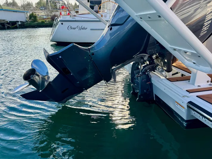  Yacht Photos Pics 2024 Ranger Tugs R-27 boat engine in water, showcasing sleek design and functionality.