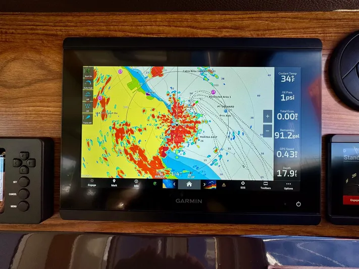  Yacht Photos Pics 2024 Ranger Tugs R-27 navigation display with Garmin GPS and colorful map interface.