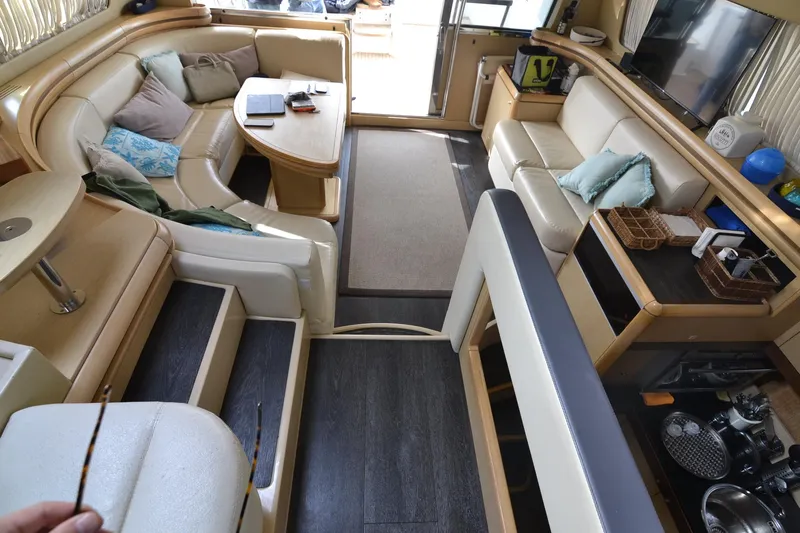 Yacht Photos Pics Luxurious interior of a 2006 Ferretti Yachts 550 with elegant seating and modern amenities.