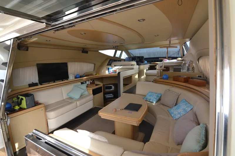  Yacht Photos Pics Luxurious interior of a 2006 Ferretti Yachts 550, featuring elegant seating and modern amenities.