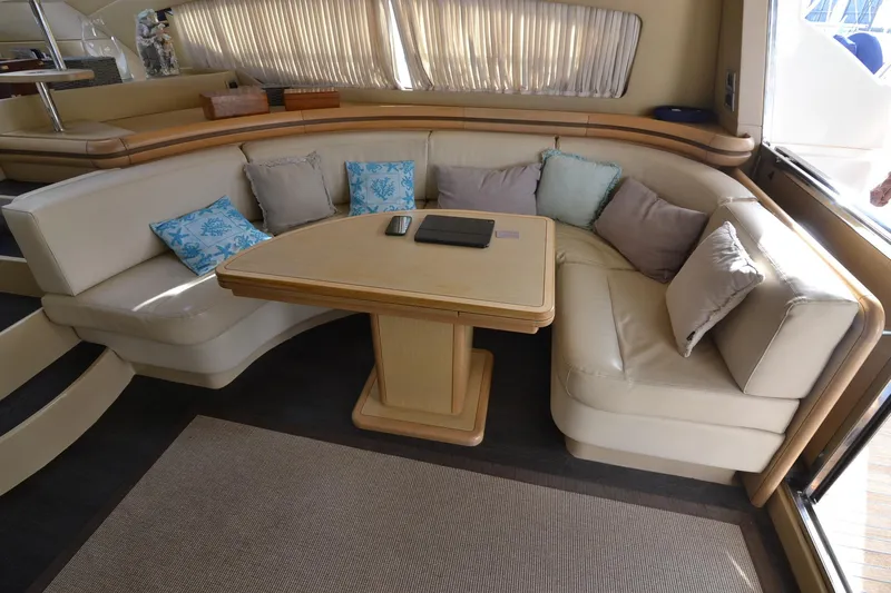  Yacht Photos Pics Luxurious interior of 2006 Ferretti Yachts 550 with elegant seating and cushions.