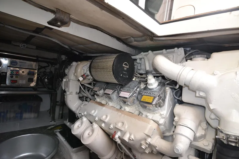  Yacht Photos Pics Engine room of a 2006 Ferretti Yachts 550, showcasing a MAN diesel engine.