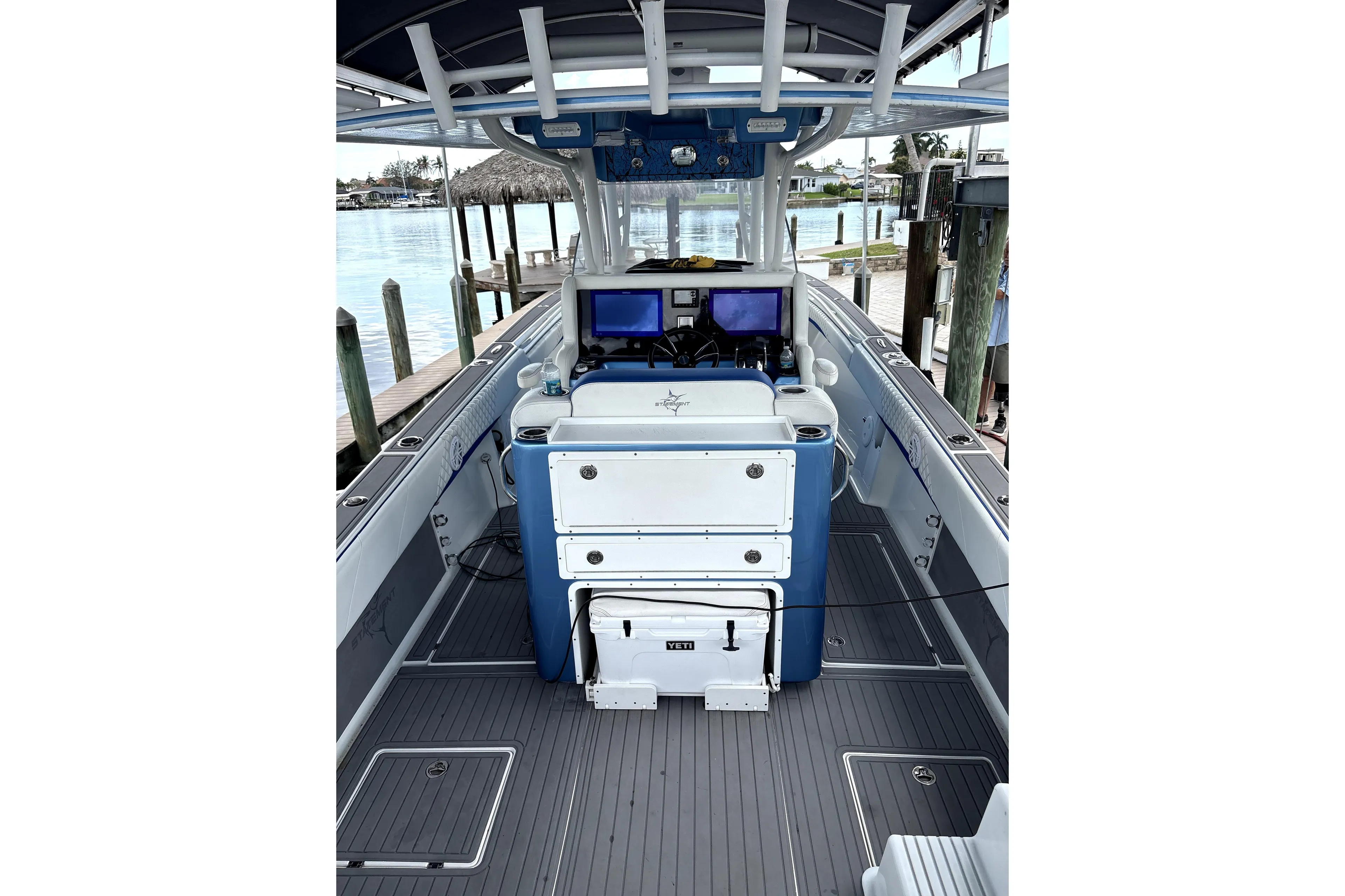 2019 Statement Fishing Edition boat interior with dual screens and storage compartments.