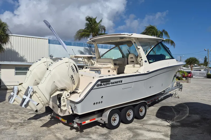 346-624 Yacht Photos Pics 2026 Grady-White Freedom 345 boat on trailer, featuring dual Yamaha engines.