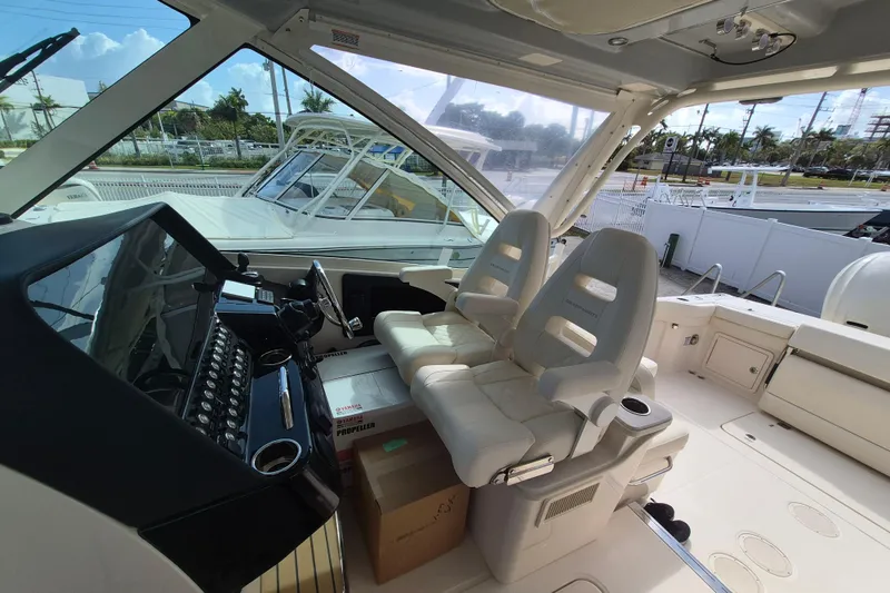 346-624 Yacht Photos Pics 2026 Grady-White Freedom 345 boat interior with dual helm seats and control panel.