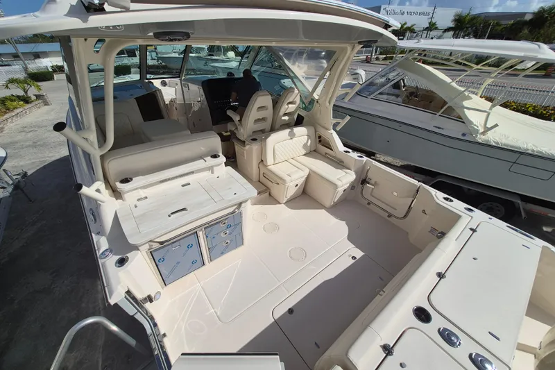 346-624 Yacht Photos Pics 2026 Grady-White Freedom 345 boat interior with seating and storage compartments.