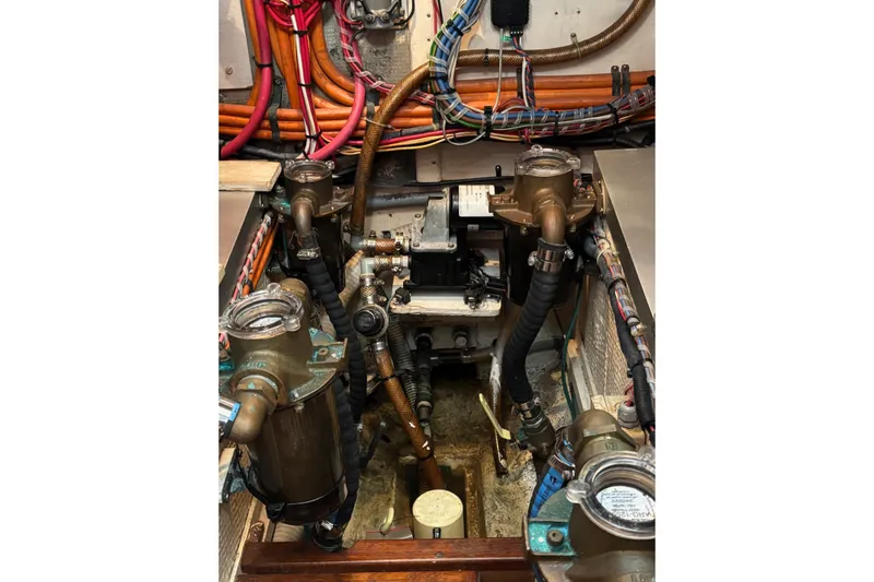  Yacht Photos Pics Engine room of a 1996 Grand Banks 36 Motoryacht with visible wiring and components.