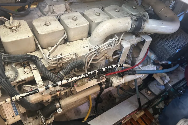  Yacht Photos Pics Engine compartment of a 1996 Grand Banks 36 Motoryacht, showcasing mechanical components.