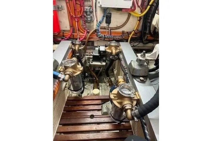 Yacht Photos Pics Engine room of a 1996 Grand Banks 36 Sedan with visible mechanical components.