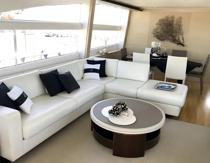 Ms Felice Yacht Photos Pics Luxurious interior of 2016 Princess 82 Ms Felice yacht with elegant white seating.