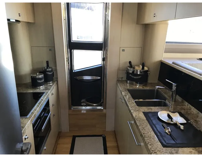 Ms Felice Yacht Photos Pics Luxurious kitchen interior of 2016 Princess 82 Ms Felice yacht with modern amenities.