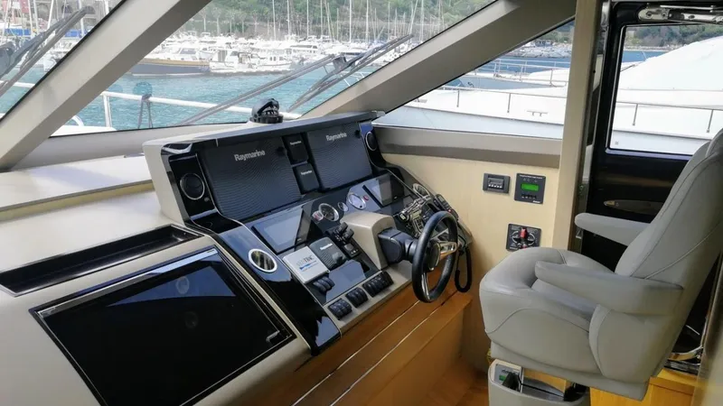 Ms Felice Yacht Photos Pics Helm of 2016 Princess 82 Ms Felice yacht with modern navigation equipment.