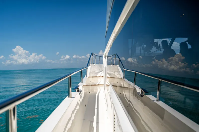 Comfortably Numb Yacht Photos Pics Princess Y75 Motor Yacht 2018 cruising on clear blue waters.