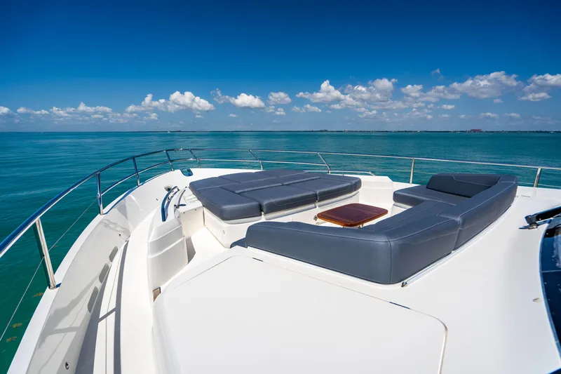 Comfortably Numb Yacht Photos Pics 2018 Princess Y75 Motor Yacht deck with luxurious seating and ocean view.