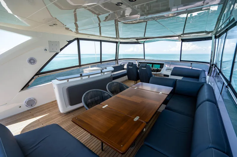 Comfortably Numb Yacht Photos Pics 2018 Princess Y75 Motor Yacht interior with luxurious seating and ocean view.