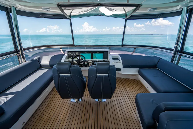 Comfortably Numb Yacht Photos Pics 2018 Princess Y75 Motor Yacht helm station with panoramic ocean view.