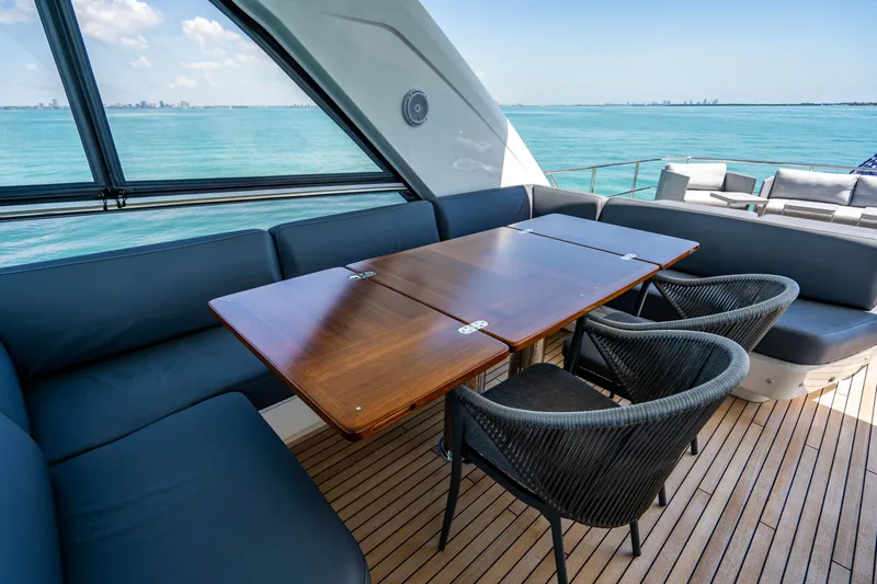 Comfortably Numb Yacht Photos Pics 2018 Princess Y75 Motor Yacht interior dining area with ocean view.