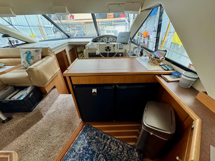 The Journey Yacht Photos Pics Interior of 1999 Bayliner 3988 Command Bridge Motoryacht with helm, seating, and navigation equipment.