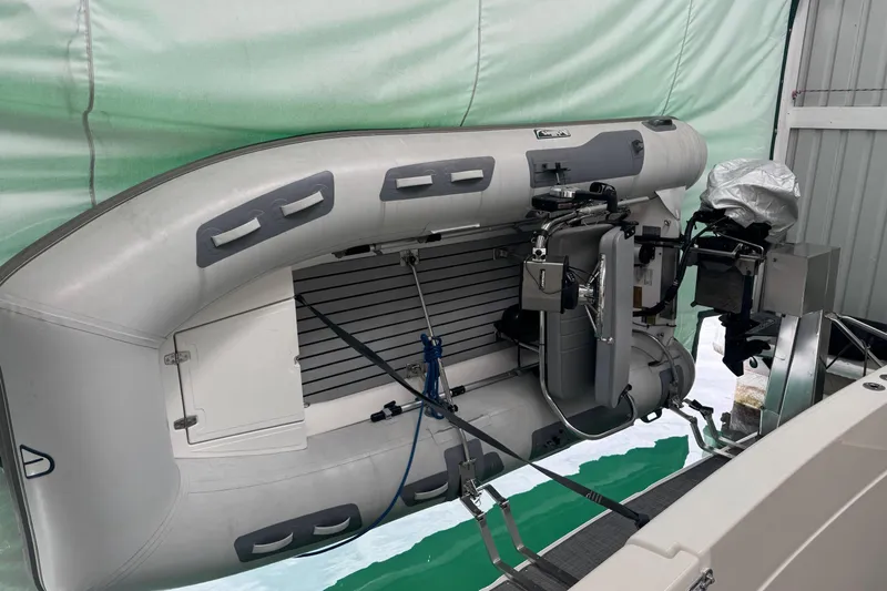 The Journey Yacht Photos Pics Inflatable boat mounted on a 1999 Bayliner 3988 Command Bridge Motoryacht.