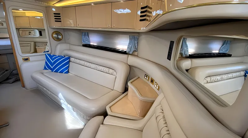  Yacht Photos Pics Luxurious interior of 1999 Sea Ray 460 Sundancer yacht with beige leather seating.