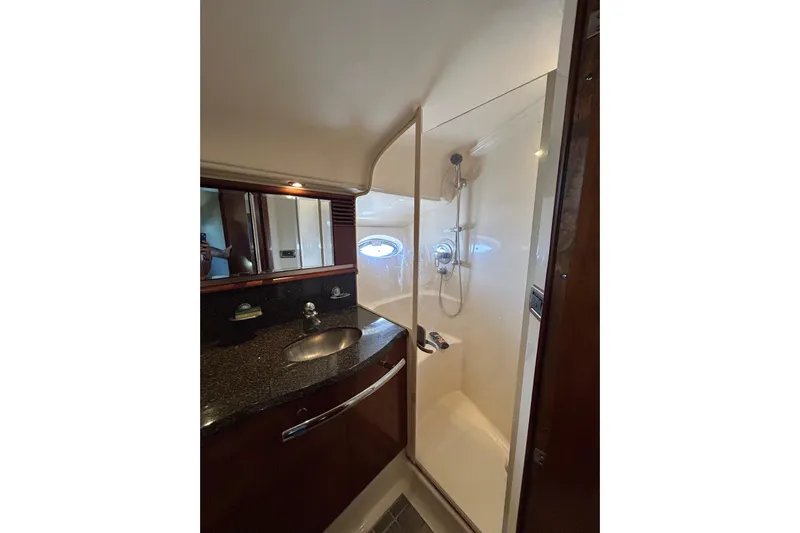 Blue Diamond Yacht Photos Pics Luxurious bathroom in 2005 Sea Ray 500 Sundancer yacht with shower and sink.