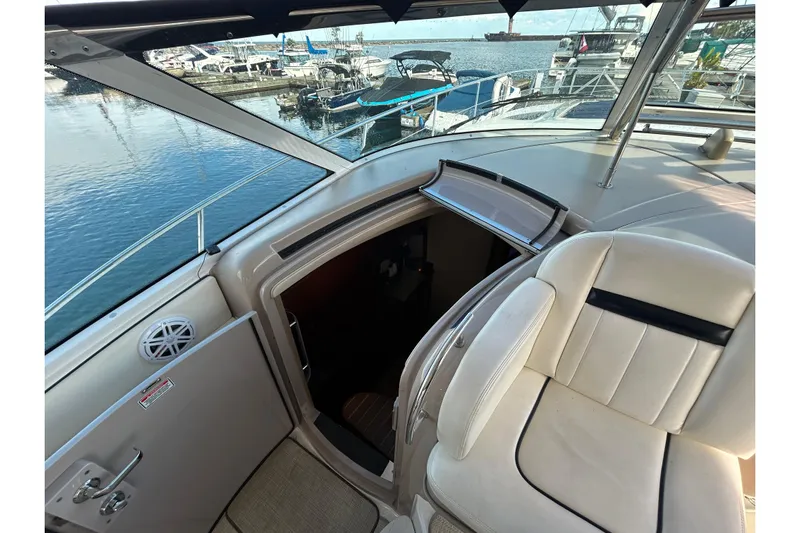 Blue Diamond Yacht Photos Pics 2005 Sea Ray 500 Sundancer yacht interior with open cabin door, docked at marina.