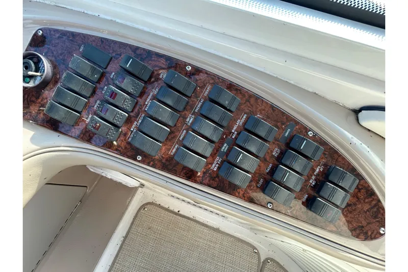 Blue Diamond Yacht Photos Pics Control panel of a 2005 Sea Ray 500 Sundancer yacht with multiple switches.