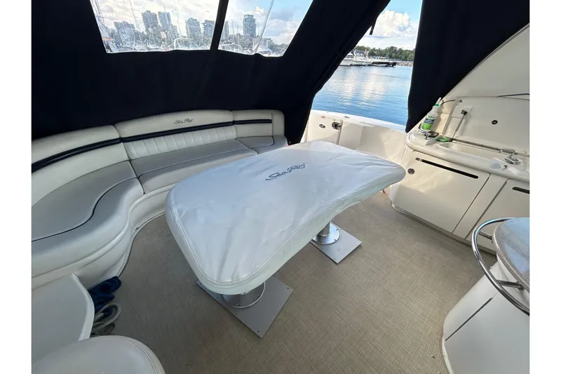 Blue Diamond Yacht Photos Pics Luxurious interior of 2005 Sea Ray 500 Sundancer yacht with waterfront view.