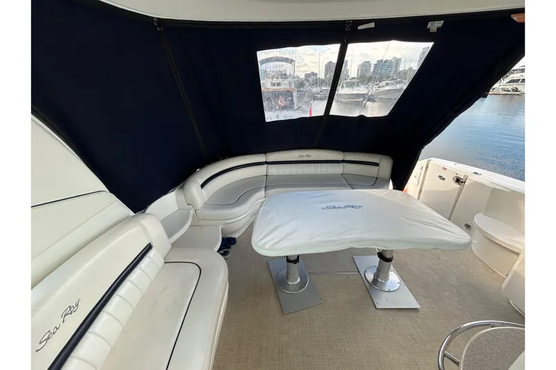 Blue Diamond Yacht Photos Pics Luxurious 2005 Sea Ray 500 Sundancer yacht interior with elegant seating and table.