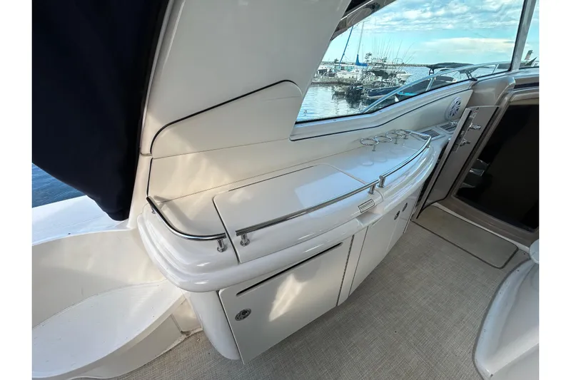 Blue Diamond Yacht Photos Pics 2005 Sea Ray 500 Sundancer yacht interior with sleek cabinetry and ocean view.