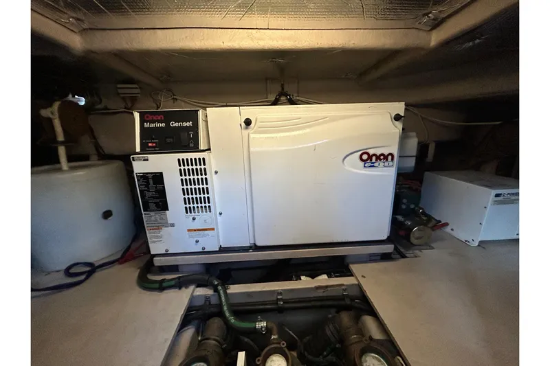 Blue Diamond Yacht Photos Pics Engine room of 2005 Sea Ray 500 Sundancer with Onan Marine Genset.