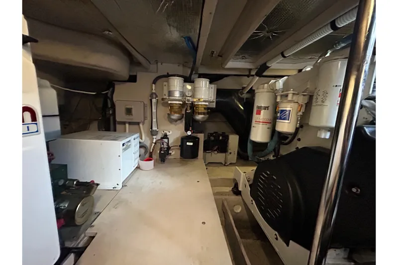 Blue Diamond Yacht Photos Pics Engine room of 2005 Sea Ray 500 Sundancer yacht, showcasing mechanical components.