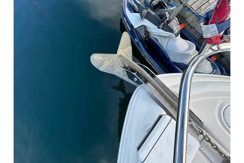 Blue Diamond Yacht Photos Pics 2005 Sea Ray 500 Sundancer yacht with anchor and jet ski at dock.