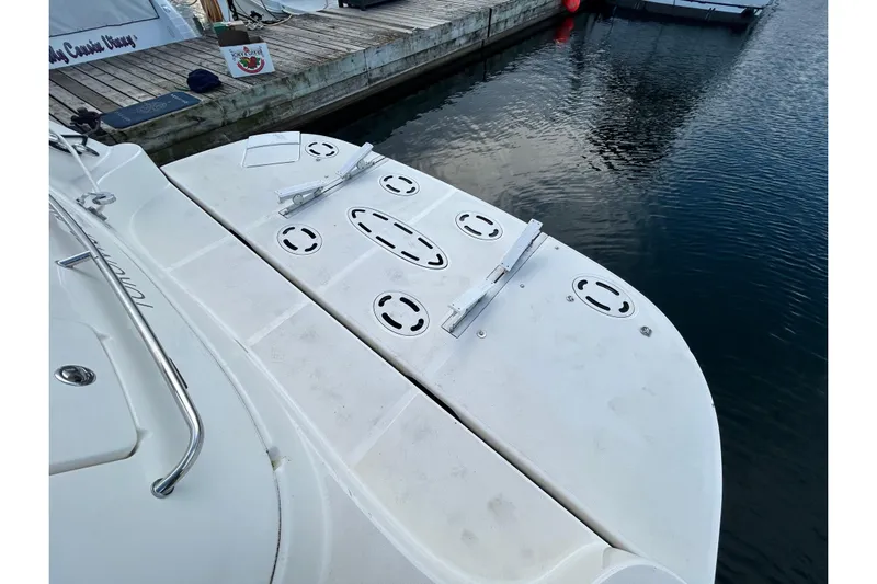 Blue Diamond Yacht Photos Pics 2005 Sea Ray 500 Sundancer swim platform at marina dock.