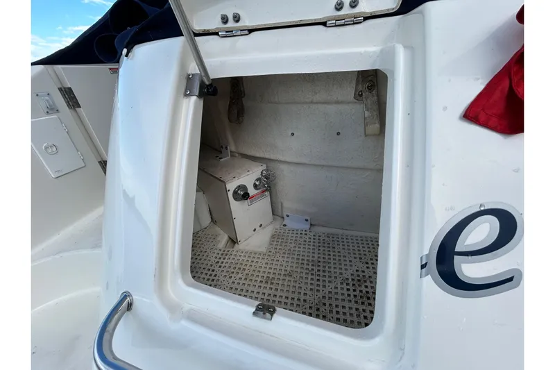Blue Diamond Yacht Photos Pics Open hatch on 2005 Sea Ray 500 Sundancer boat, showing interior compartment.