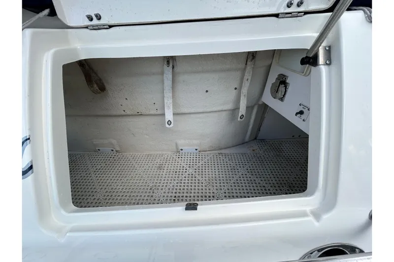 Blue Diamond Yacht Photos Pics Open storage compartment on a 2005 Sea Ray 500 Sundancer boat.