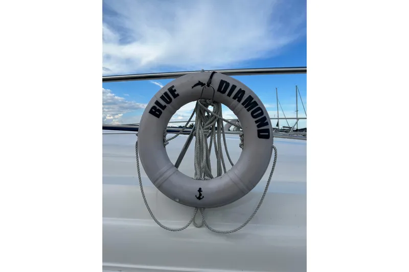 Blue Diamond Yacht Photos Pics Life ring labeled "Blue Diamond" on 2005 Sea Ray 500 Sundancer yacht.