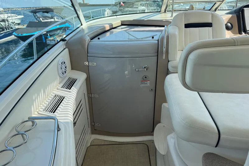 Blue Diamond Yacht Photos Pics Interior view of a 2005 Sea Ray 500 Sundancer yacht, featuring seating and storage.