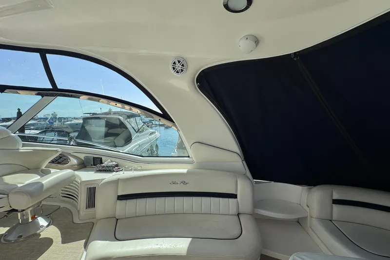 Blue Diamond Yacht Photos Pics Interior of 2005 Sea Ray 500 Sundancer yacht with luxurious seating and marina view.
