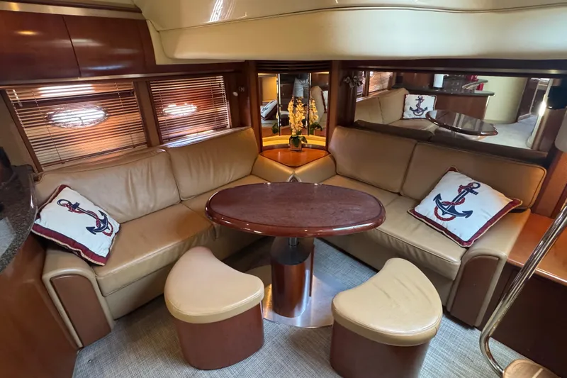Blue Diamond Yacht Photos Pics Luxurious 2005 Sea Ray 500 Sundancer yacht interior with leather seating and nautical decor.