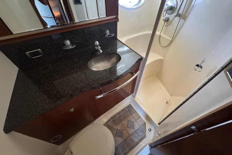 Blue Diamond Yacht Photos Pics Luxurious bathroom in 2005 Sea Ray 500 Sundancer yacht with modern fixtures.