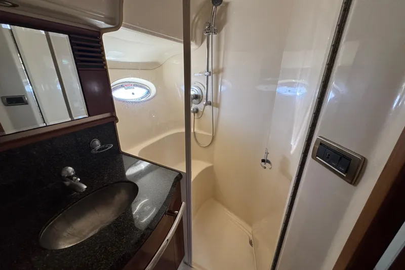 Blue Diamond Yacht Photos Pics Luxurious bathroom in 2005 Sea Ray 500 Sundancer yacht with shower and sink.