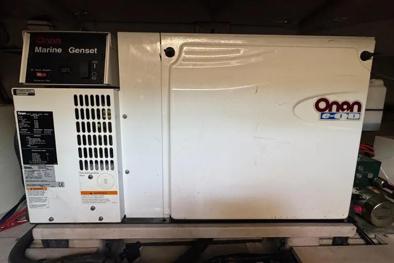 Blue Diamond Yacht Photos Pics Onan marine generator in a 2005 Sea Ray 500 Sundancer yacht engine room.